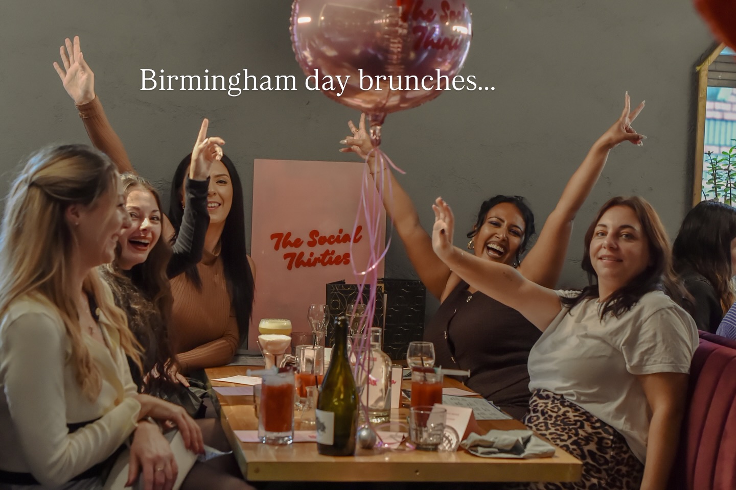 Members cheering at a brunch