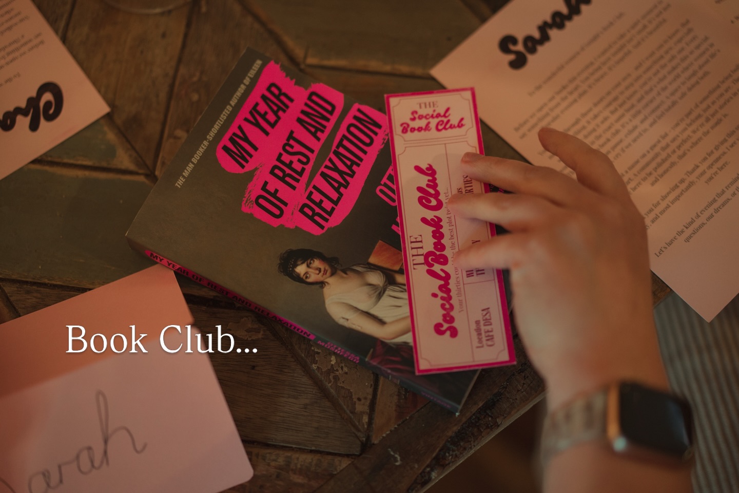 Social Thirties book club ticket and book on a table