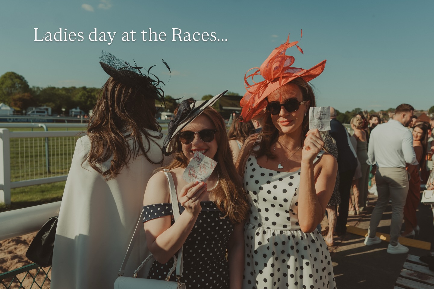 Two members in fascinators at Ladies Day at the Races
