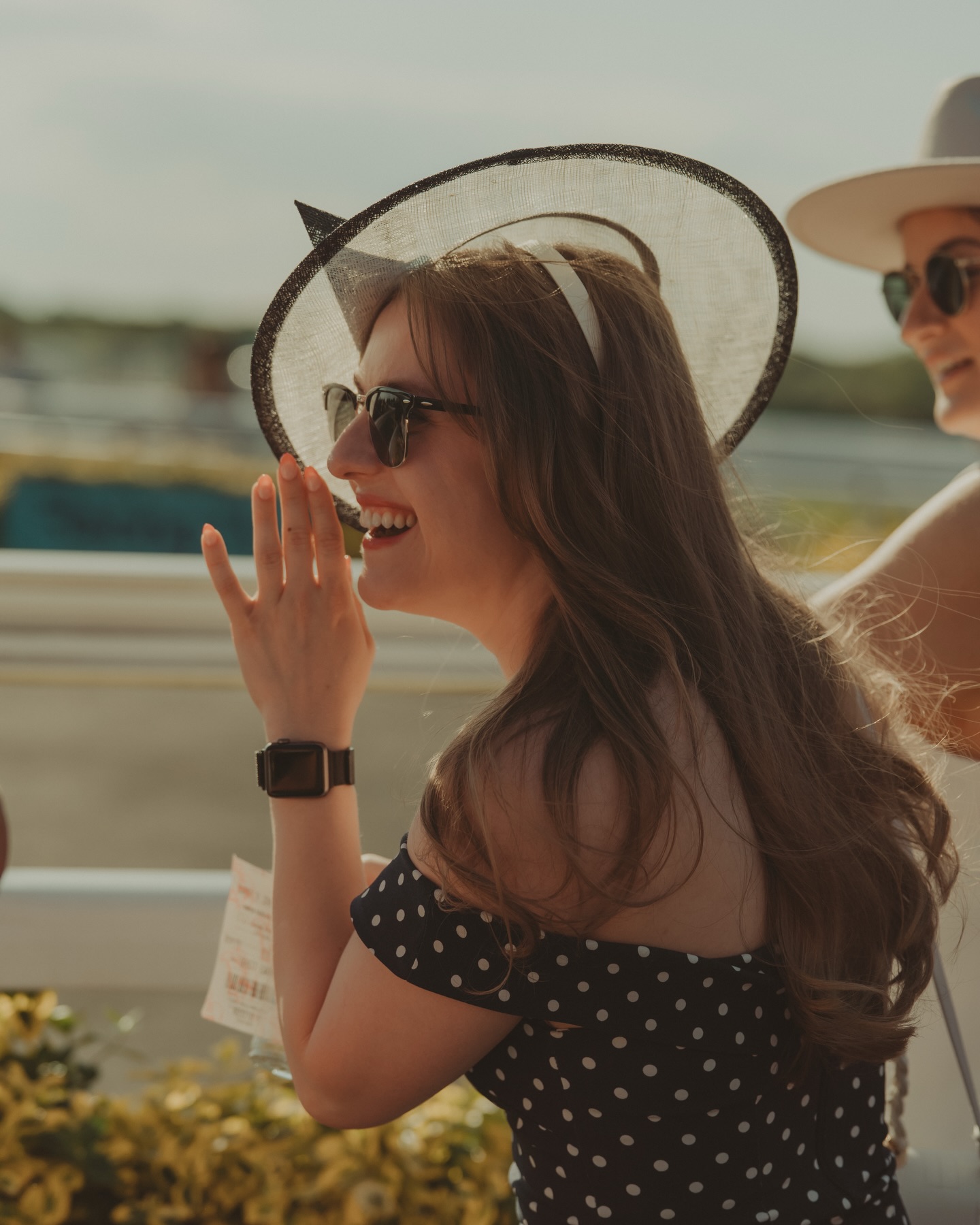 A member smiling at one of the races events